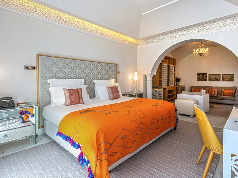 Junior Suite bedroom with king size bed and integrated living area
